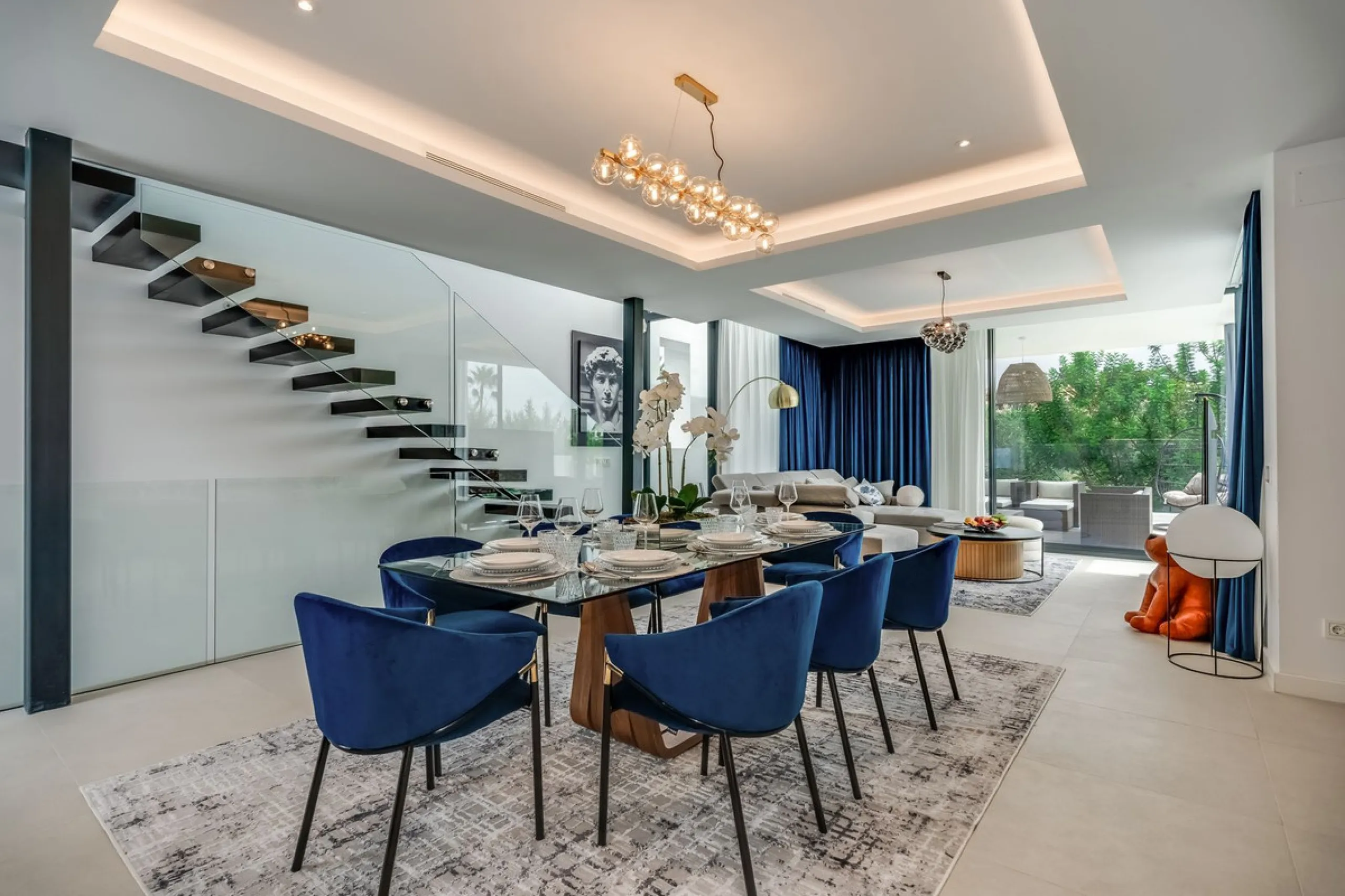 Nestled along the lush greens of Marbella's finest golf course of El Campanario, this luxurious 5-bedroom, 4.5-bath villa offers a seamless blend of elegance and state-of-the-art comfort over 460 square meters of living space. The villa's open layout invi