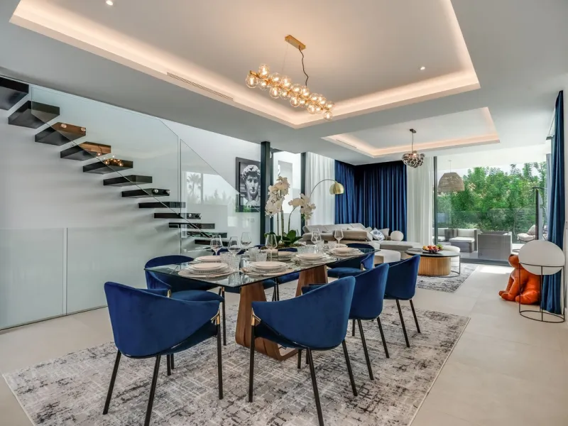Nestled along the lush greens of Marbella's finest golf course of El Campanario, this luxurious 5-bedroom, 4.5-bath villa offers a seamless blend of elegance and state-of-the-art comfort over 460 square meters of living space. The villa's open layout invi
