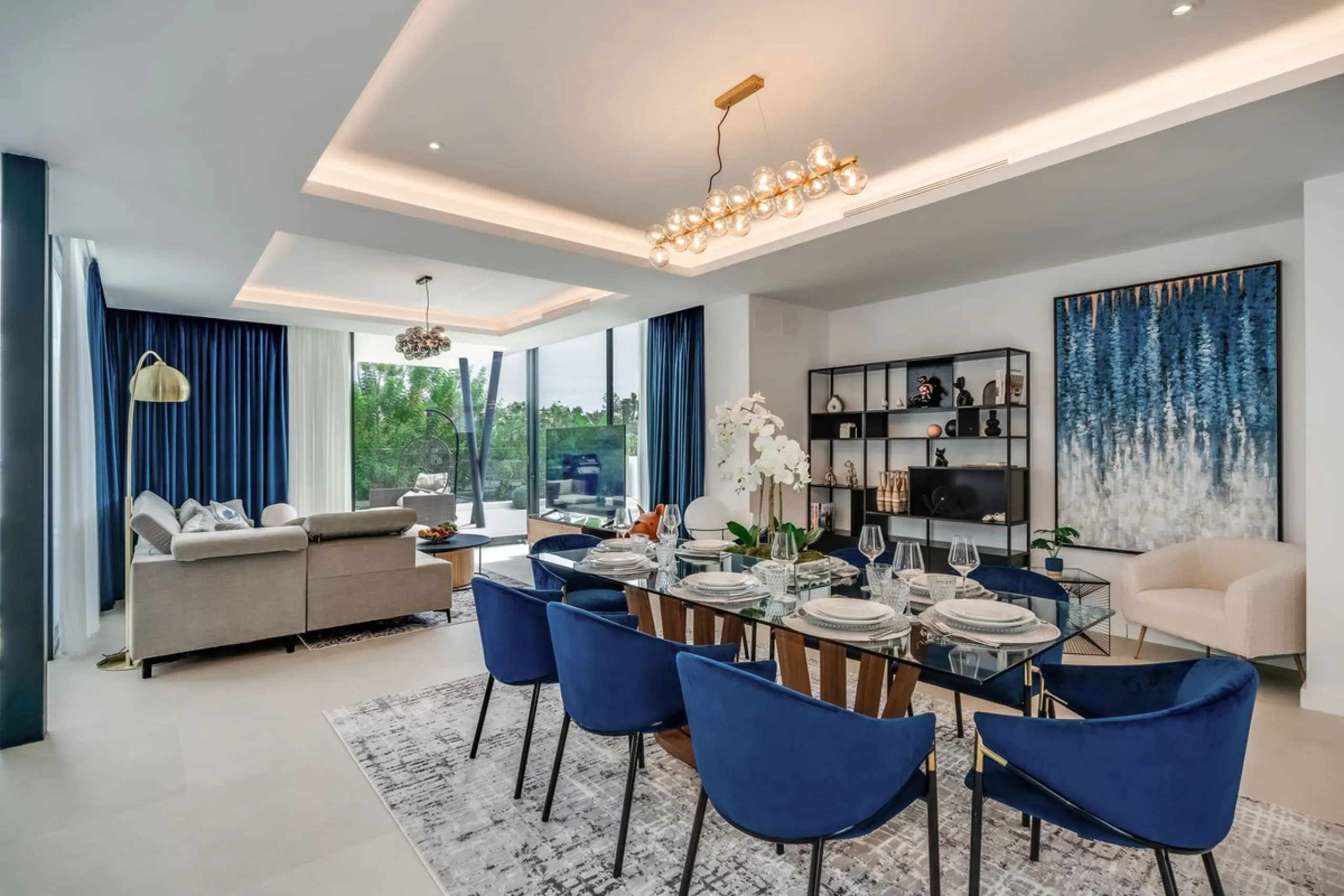 Nestled along the lush greens of Marbella's finest golf course of El Campanario, this luxurious 5-bedroom, 4.5-bath villa offers a seamless blend of elegance and state-of-the-art comfort over 460 square meters of living space. The villa's open layout invi