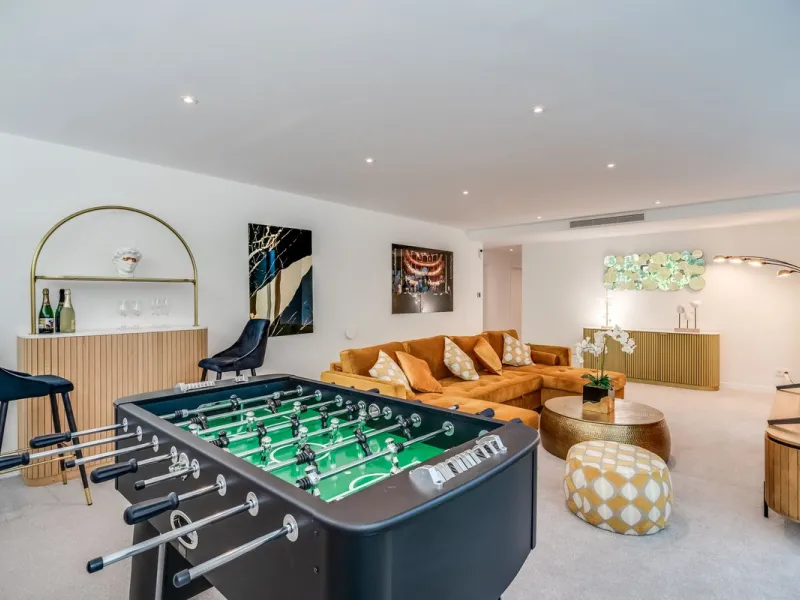 Nestled along the lush greens of Marbella's finest golf course of El Campanario, this luxurious 5-bedroom, 4.5-bath villa offers a seamless blend of elegance and state-of-the-art comfort over 460 square meters of living space. The villa's open layout invi