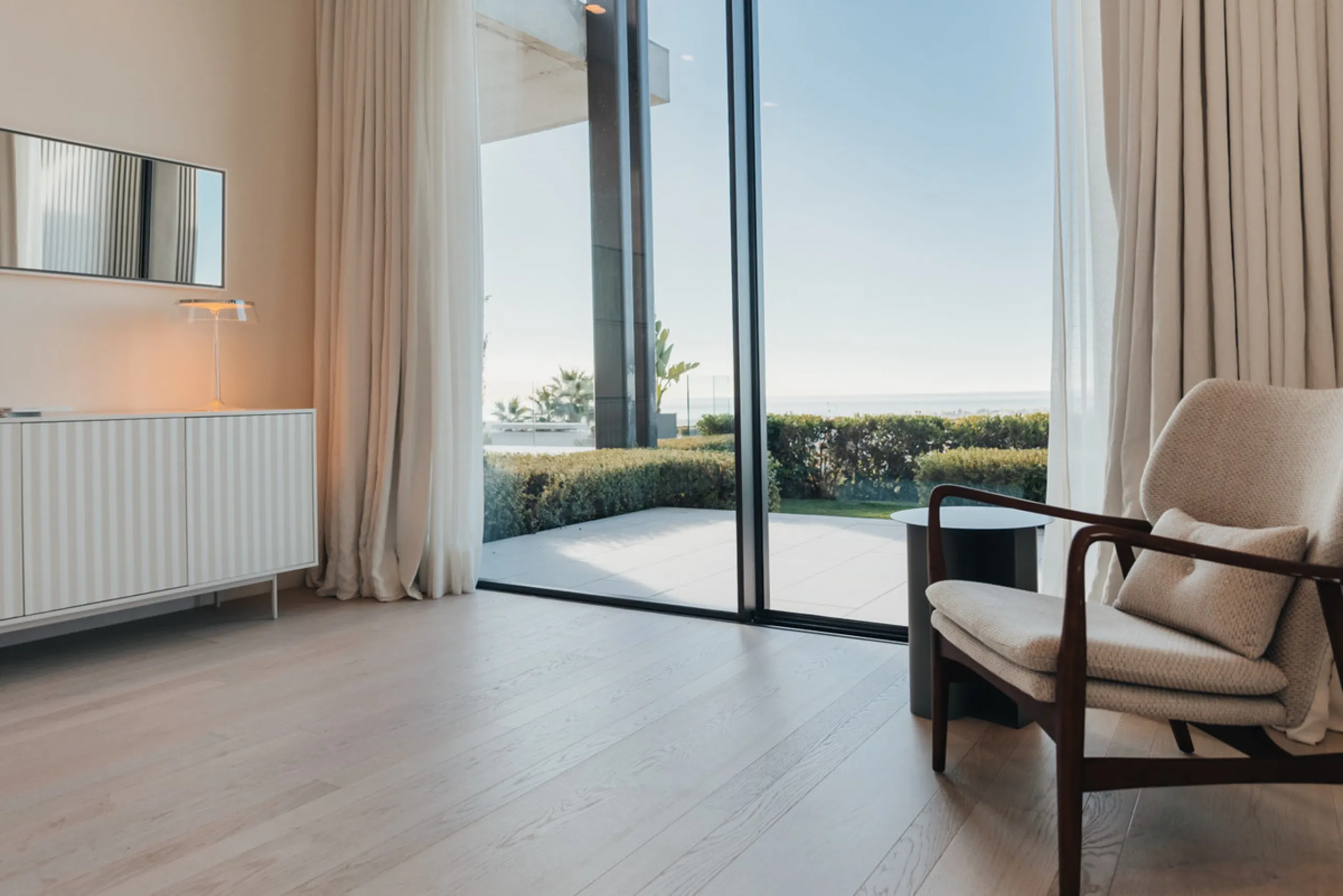 Welcome to a stunning property in The Hills, an exclusive neighborhood perched on La Quinta's cliffside. Overlooking the Mediterranean Sea, Puerto Banús, and San Pedro, this villa boasts incredible 200-degree views reaching all the way to Gibraltar and No