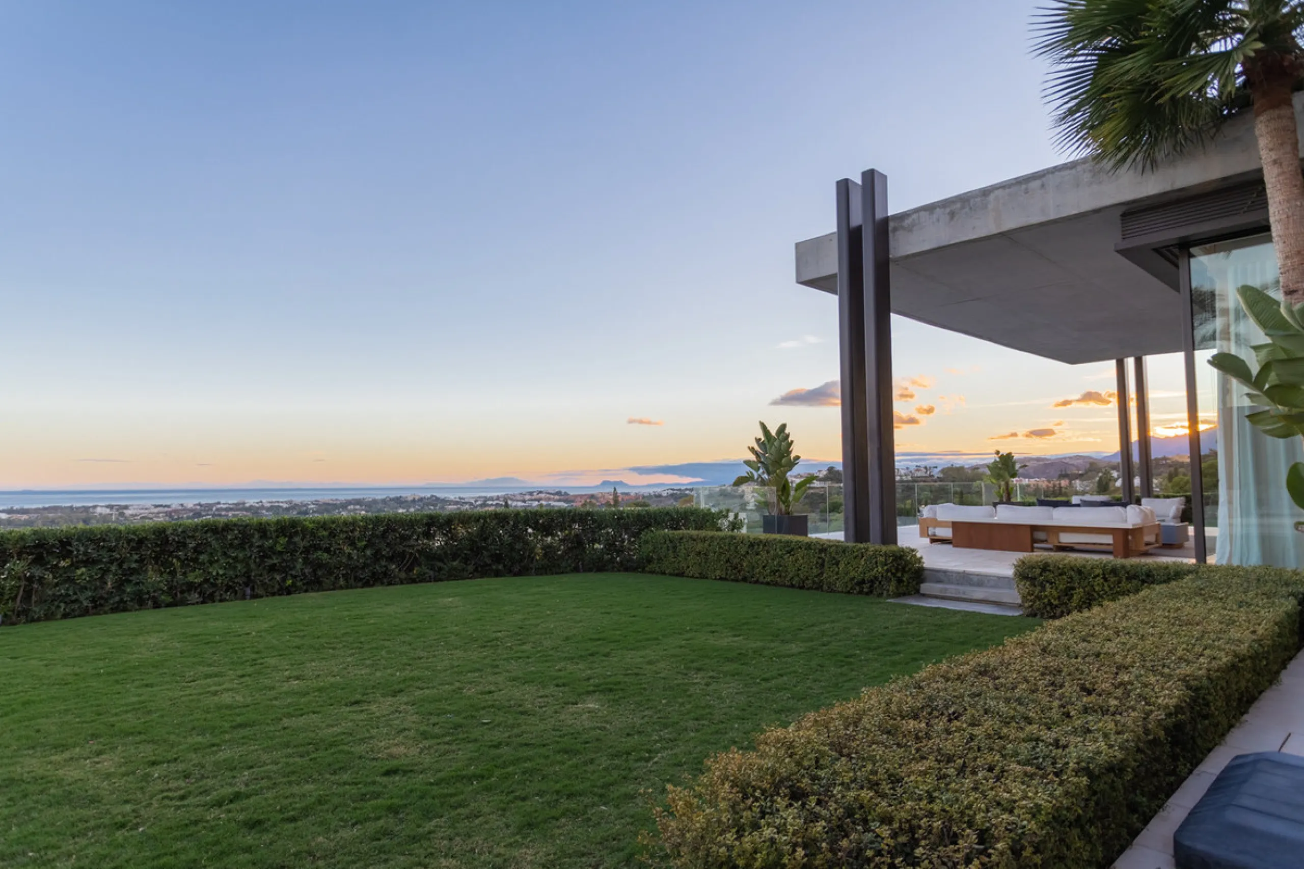 Welcome to a stunning property in The Hills, an exclusive neighborhood perched on La Quinta's cliffside. Overlooking the Mediterranean Sea, Puerto Banús, and San Pedro, this villa boasts incredible 200-degree views reaching all the way to Gibraltar and No