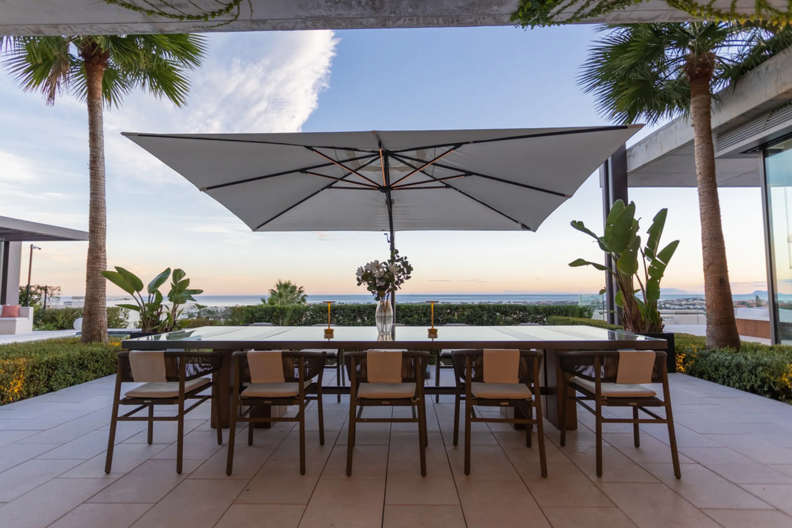 Welcome to a stunning property in The Hills, an exclusive neighborhood perched on La Quinta's cliffside. Overlooking the Mediterranean Sea, Puerto Banús, and San Pedro, this villa boasts incredible 200-degree views reaching all the way to Gibraltar and No