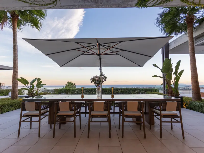 Welcome to a stunning property in The Hills, an exclusive neighborhood perched on La Quinta's cliffside. Overlooking the Mediterranean Sea, Puerto Banús, and San Pedro, this villa boasts incredible 200-degree views reaching all the way to Gibraltar and No