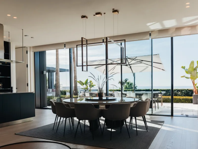 Welcome to a stunning property in The Hills, an exclusive neighborhood perched on La Quinta's cliffside. Overlooking the Mediterranean Sea, Puerto Banús, and San Pedro, this villa boasts incredible 200-degree views reaching all the way to Gibraltar and No