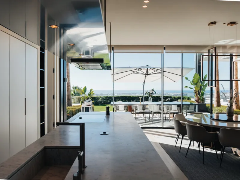 Welcome to a stunning property in The Hills, an exclusive neighborhood perched on La Quinta's cliffside. Overlooking the Mediterranean Sea, Puerto Banús, and San Pedro, this villa boasts incredible 200-degree views reaching all the way to Gibraltar and No