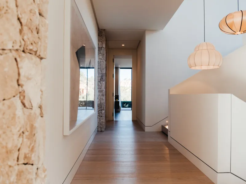 Welcome to a stunning property in The Hills, an exclusive neighborhood perched on La Quinta's cliffside. Overlooking the Mediterranean Sea, Puerto Banús, and San Pedro, this villa boasts incredible 200-degree views reaching all the way to Gibraltar and No