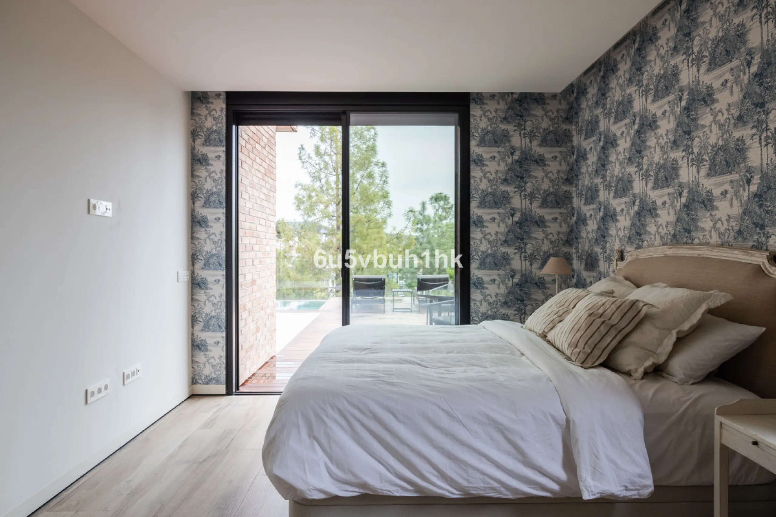 Exquisite modern villa, a newly built family home that perfectly blends contemporary design with comfort and convenience. Nestled in the desirable neighborhood of El Atabal, Malaga, this three-story residence offers breathtaking sea and mountain views fro