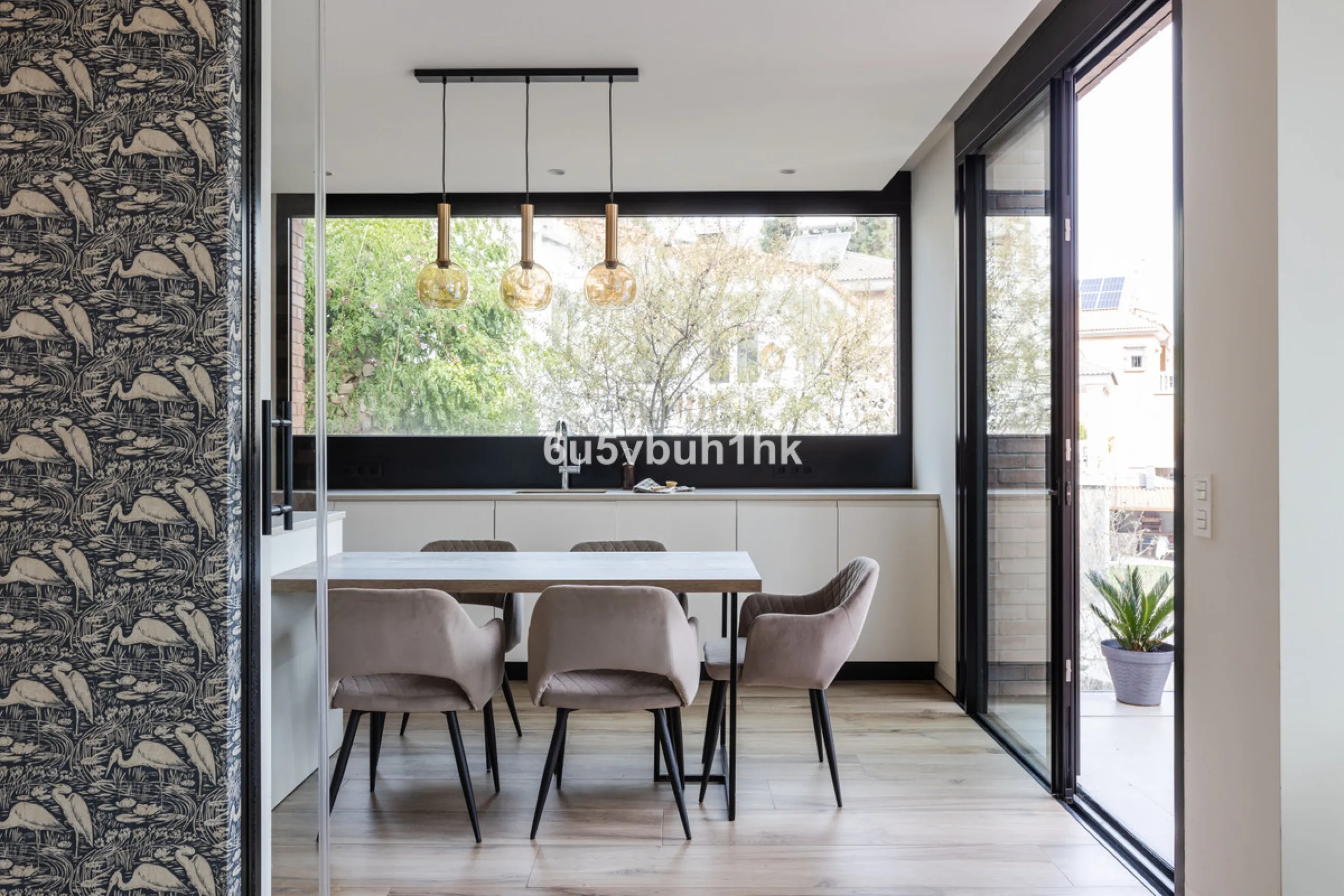Exquisite modern villa, a newly built family home that perfectly blends contemporary design with comfort and convenience. Nestled in the desirable neighborhood of El Atabal, Malaga, this three-story residence offers breathtaking sea and mountain views fro