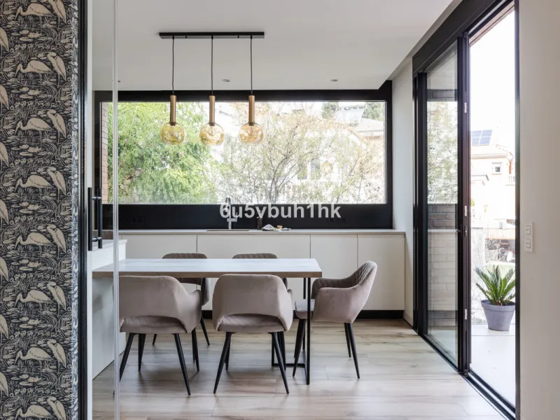 Exquisite modern villa, a newly built family home that perfectly blends contemporary design with comfort and convenience. Nestled in the desirable neighborhood of El Atabal, Malaga, this three-story residence offers breathtaking sea and mountain views fro