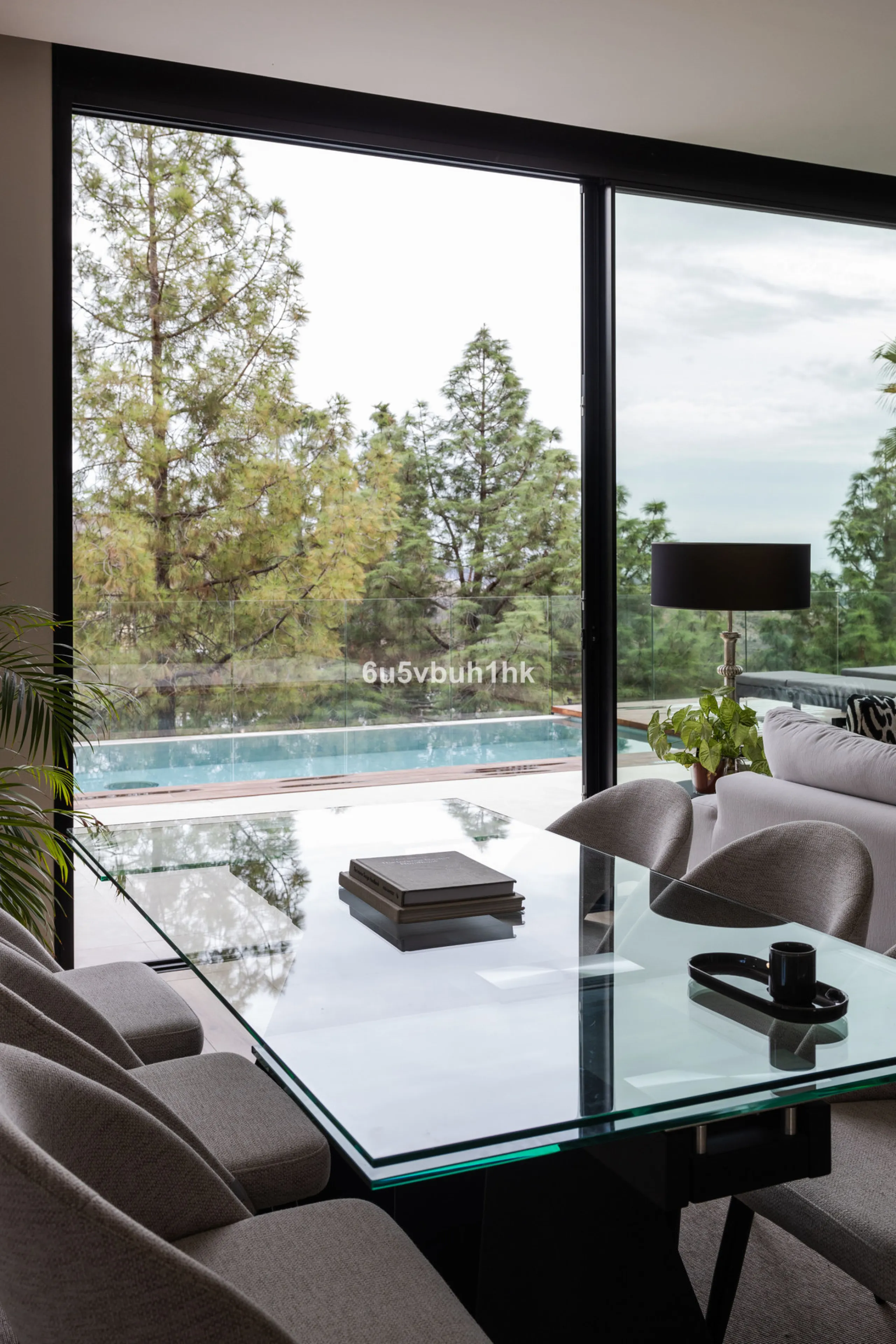 Exquisite modern villa, a newly built family home that perfectly blends contemporary design with comfort and convenience. Nestled in the desirable neighborhood of El Atabal, Malaga, this three-story residence offers breathtaking sea and mountain views fro