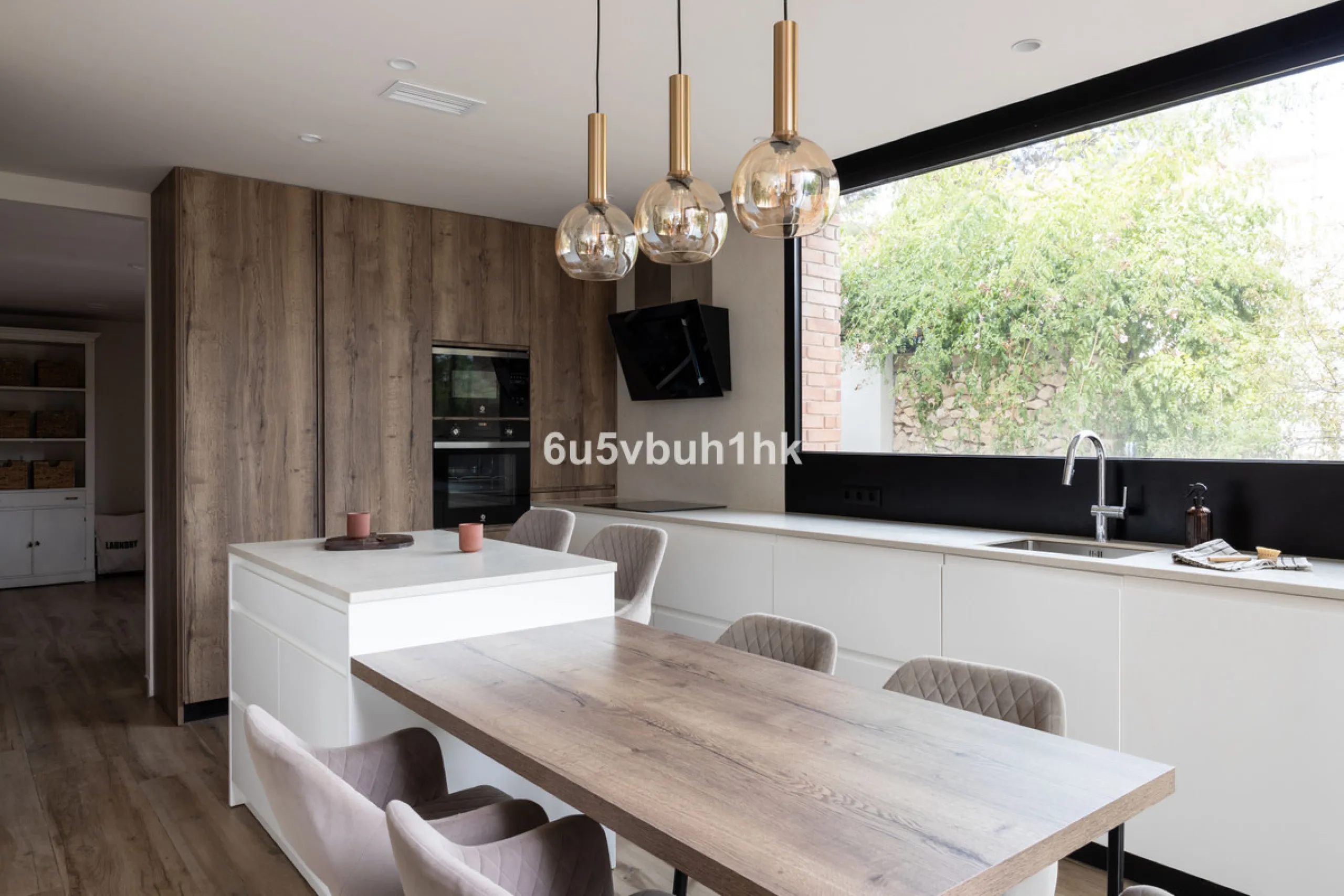 Exquisite modern villa, a newly built family home that perfectly blends contemporary design with comfort and convenience. Nestled in the desirable neighborhood of El Atabal, Malaga, this three-story residence offers breathtaking sea and mountain views fro