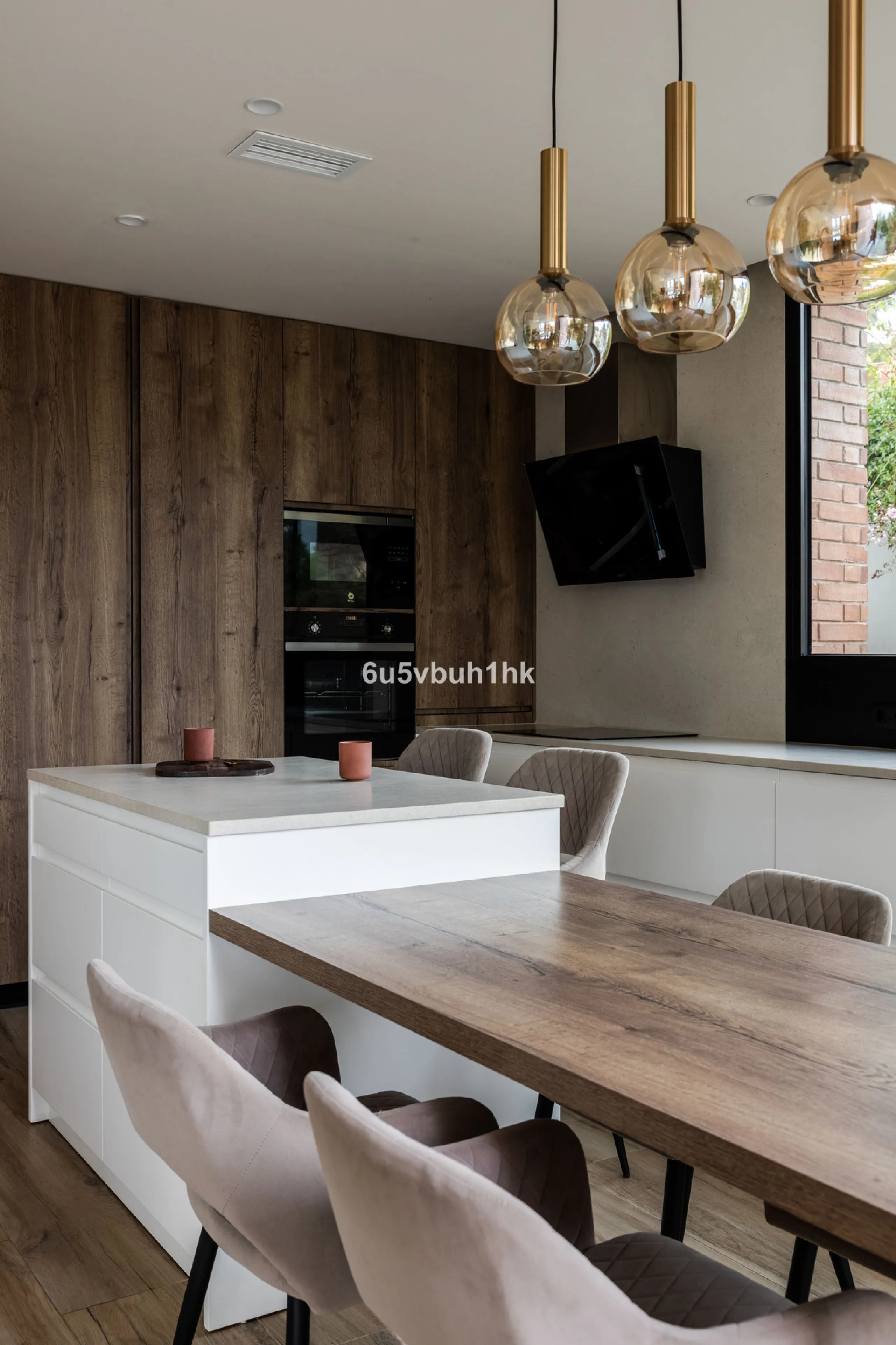 Exquisite modern villa, a newly built family home that perfectly blends contemporary design with comfort and convenience. Nestled in the desirable neighborhood of El Atabal, Malaga, this three-story residence offers breathtaking sea and mountain views fro