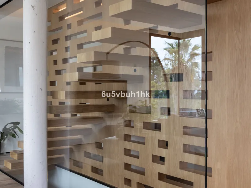 Exquisite modern villa, a newly built family home that perfectly blends contemporary design with comfort and convenience. Nestled in the desirable neighborhood of El Atabal, Malaga, this three-story residence offers breathtaking sea and mountain views fro