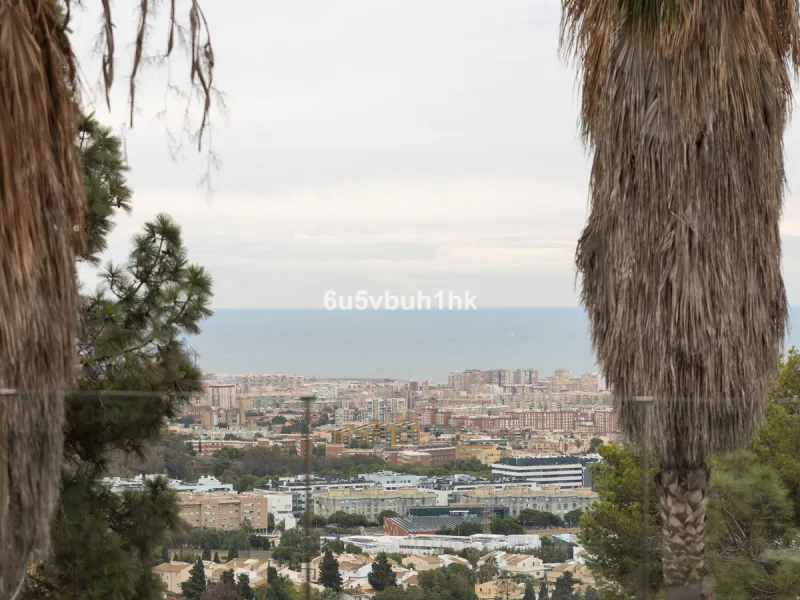 Exquisite modern villa, a newly built family home that perfectly blends contemporary design with comfort and convenience. Nestled in the desirable neighborhood of El Atabal, Malaga, this three-story residence offers breathtaking sea and mountain views fro