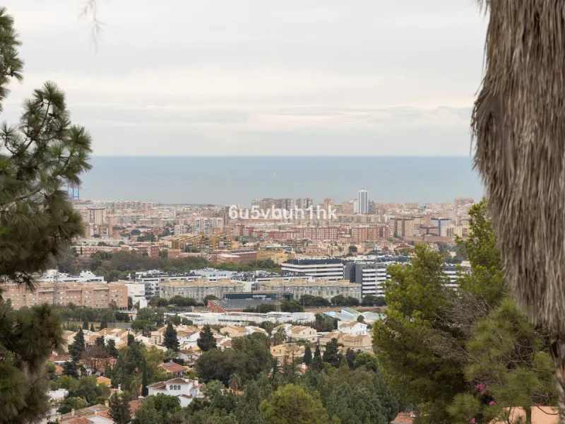 Exquisite modern villa, a newly built family home that perfectly blends contemporary design with comfort and convenience. Nestled in the desirable neighborhood of El Atabal, Malaga, this three-story residence offers breathtaking sea and mountain views fro