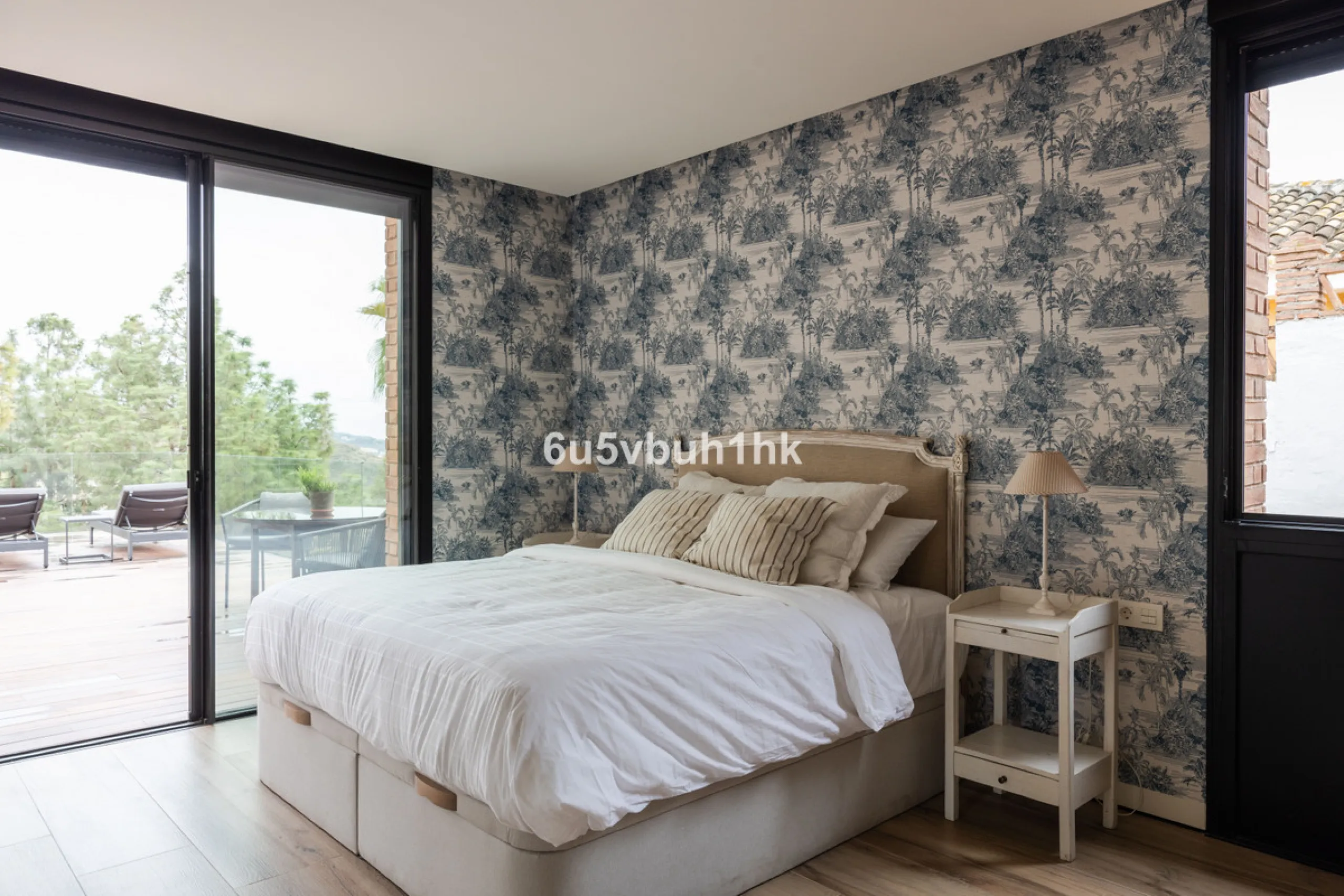Exquisite modern villa, a newly built family home that perfectly blends contemporary design with comfort and convenience. Nestled in the desirable neighborhood of El Atabal, Malaga, this three-story residence offers breathtaking sea and mountain views fro