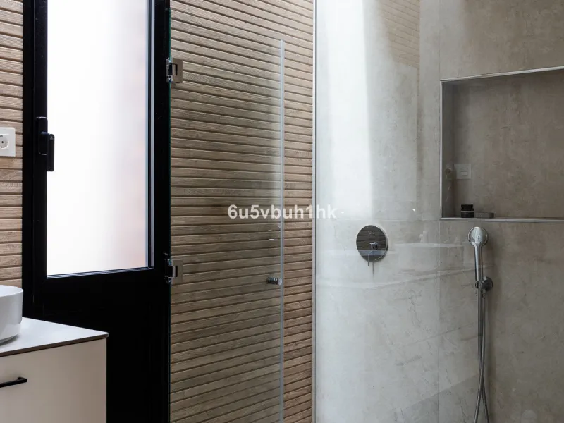 Exquisite modern villa, a newly built family home that perfectly blends contemporary design with comfort and convenience. Nestled in the desirable neighborhood of El Atabal, Malaga, this three-story residence offers breathtaking sea and mountain views fro