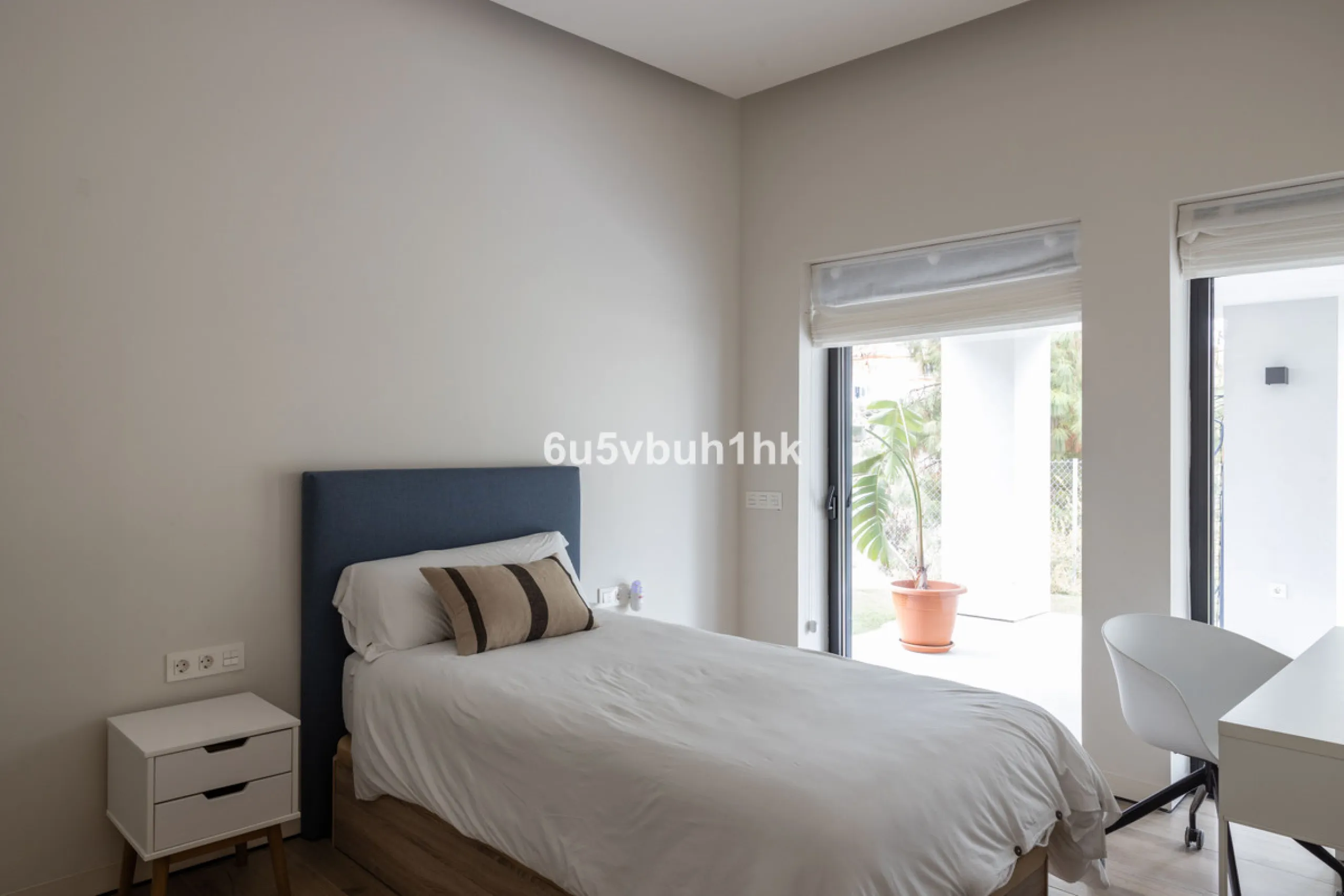 Exquisite modern villa, a newly built family home that perfectly blends contemporary design with comfort and convenience. Nestled in the desirable neighborhood of El Atabal, Malaga, this three-story residence offers breathtaking sea and mountain views fro