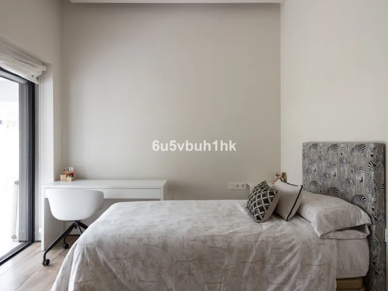 Exquisite modern villa, a newly built family home that perfectly blends contemporary design with comfort and convenience. Nestled in the desirable neighborhood of El Atabal, Malaga, this three-story residence offers breathtaking sea and mountain views fro