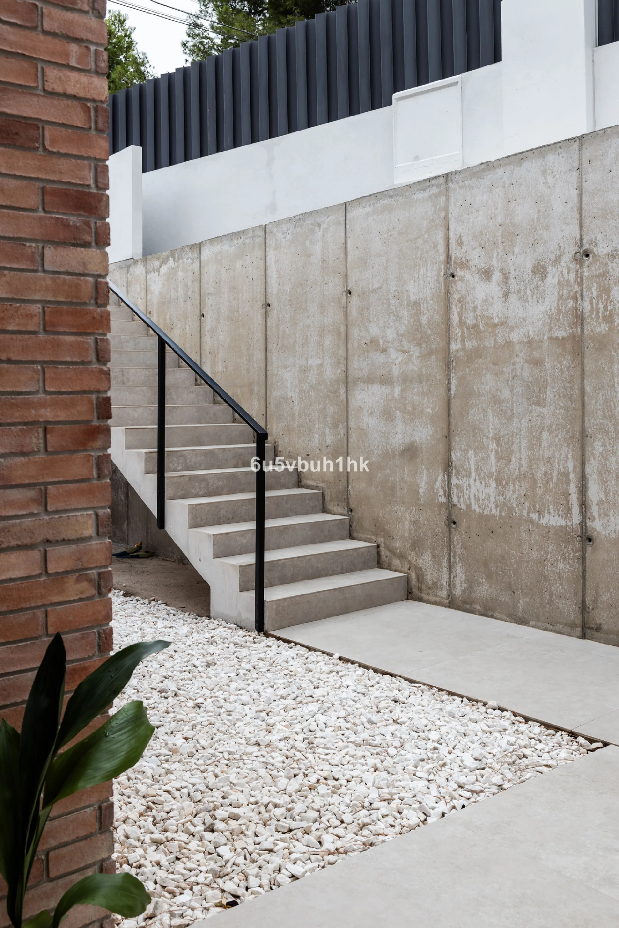 Exquisite modern villa, a newly built family home that perfectly blends contemporary design with comfort and convenience. Nestled in the desirable neighborhood of El Atabal, Malaga, this three-story residence offers breathtaking sea and mountain views fro