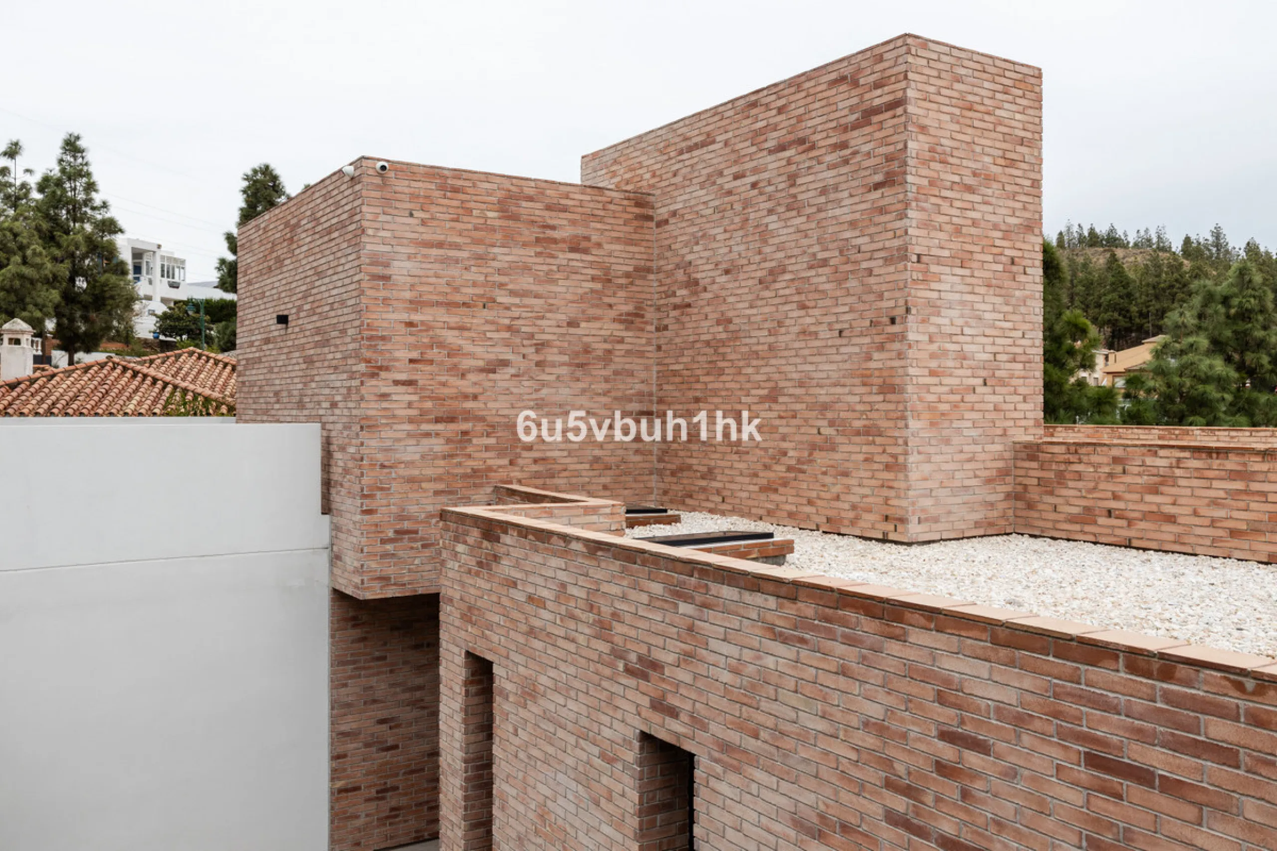 Exquisite modern villa, a newly built family home that perfectly blends contemporary design with comfort and convenience. Nestled in the desirable neighborhood of El Atabal, Malaga, this three-story residence offers breathtaking sea and mountain views fro