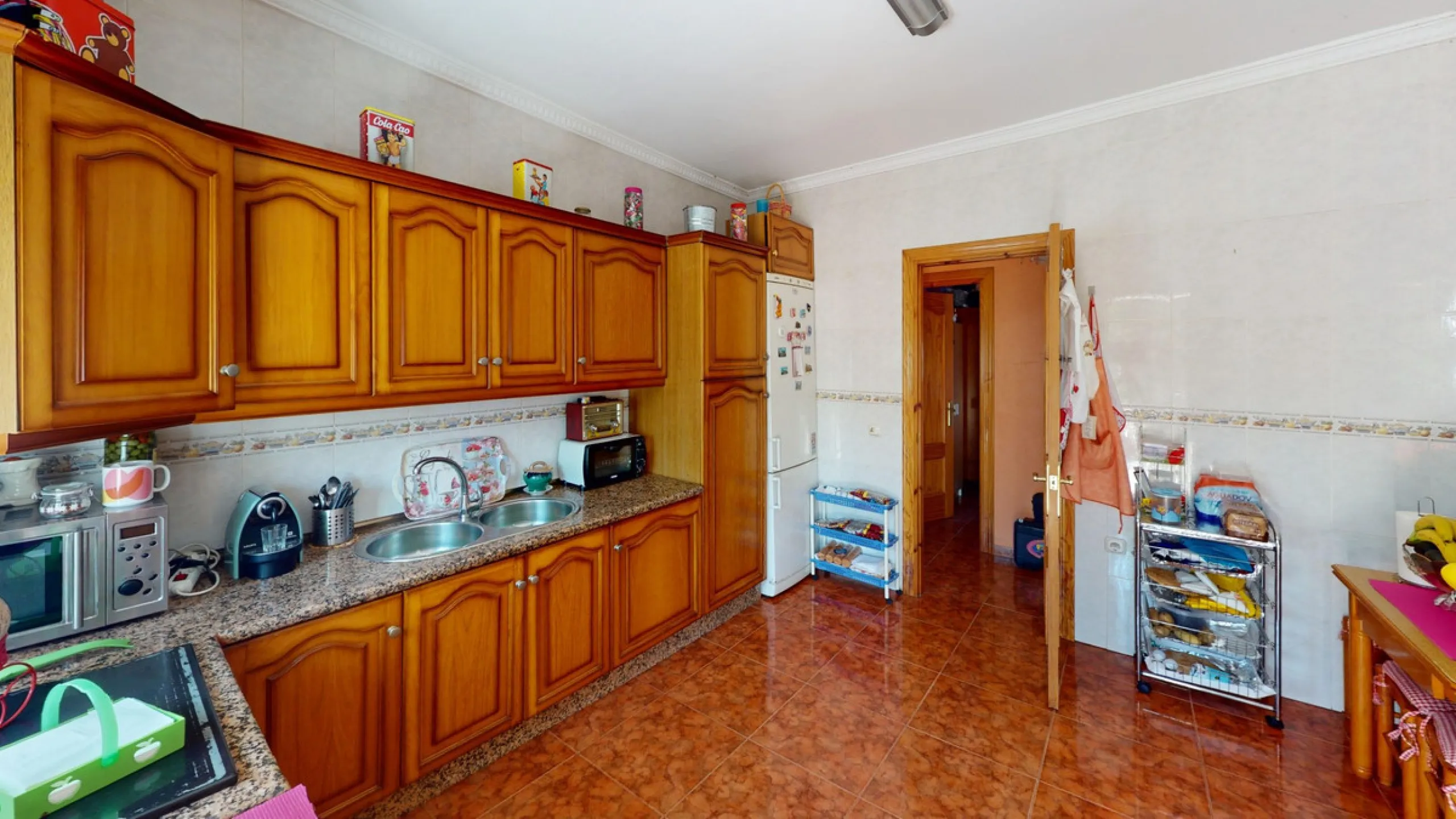 This charming finca is situated in a serene and peaceful location, offering picturesque views of the surrounding landscape. The expansive property boasts 280 magnificent mango trees, 90 stately avocado trees, and several blooming citrus trees, creating a 