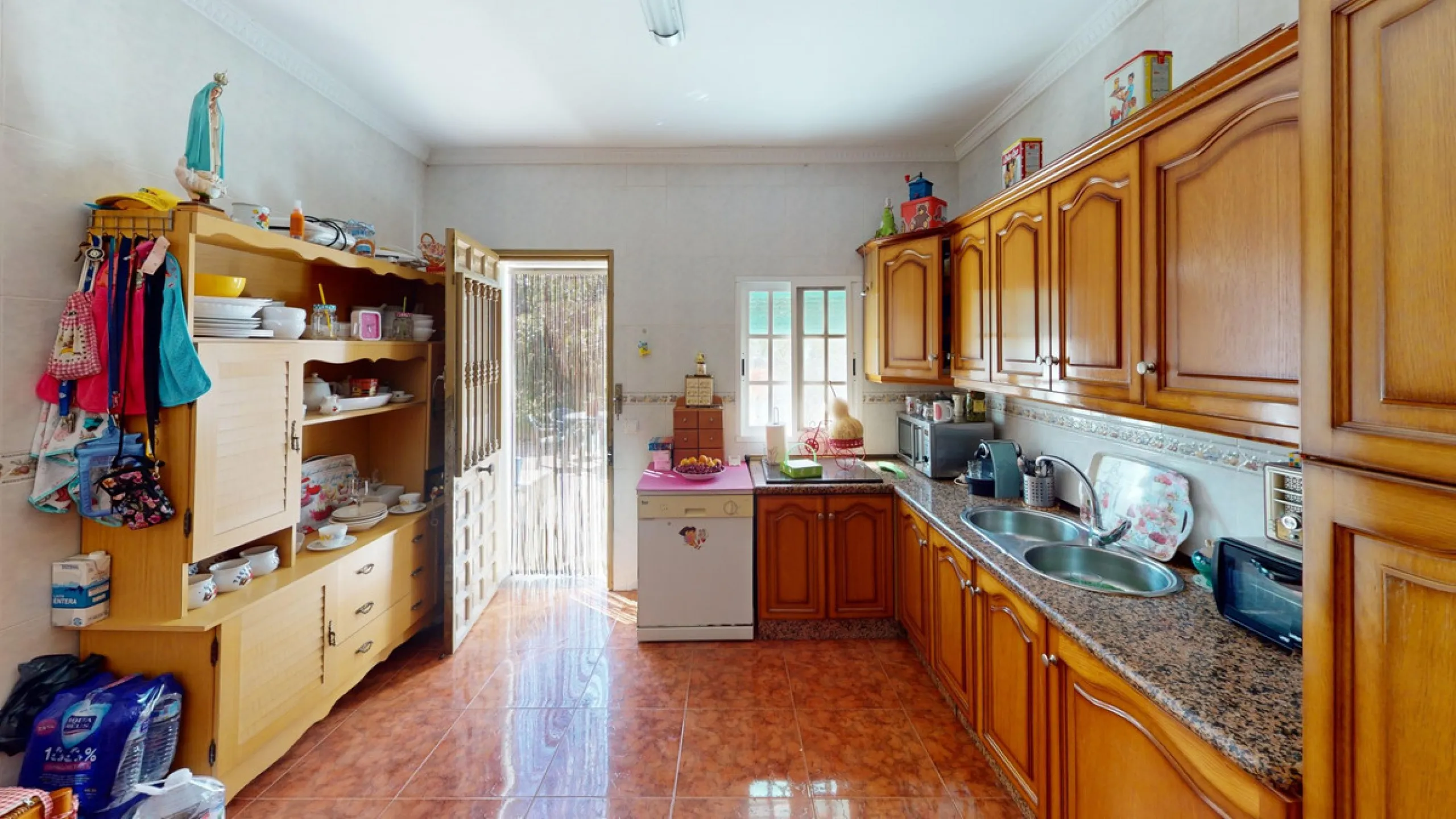 This charming finca is situated in a serene and peaceful location, offering picturesque views of the surrounding landscape. The expansive property boasts 280 magnificent mango trees, 90 stately avocado trees, and several blooming citrus trees, creating a 
