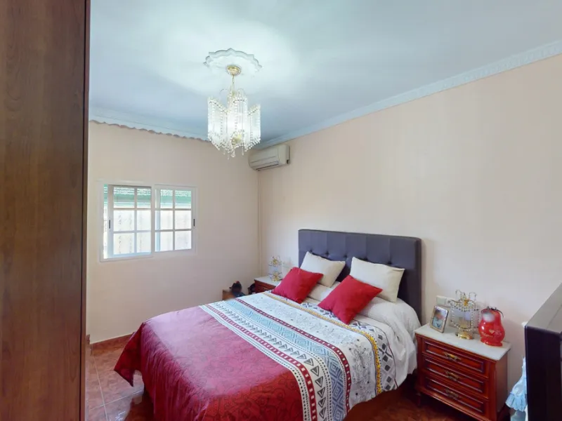 This charming finca is situated in a serene and peaceful location, offering picturesque views of the surrounding landscape. The expansive property boasts 280 magnificent mango trees, 90 stately avocado trees, and several blooming citrus trees, creating a 