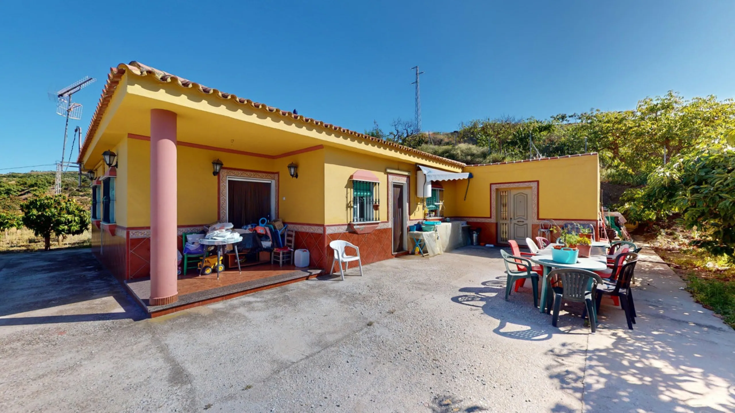 This charming finca is situated in a serene and peaceful location, offering picturesque views of the surrounding landscape. The expansive property boasts 280 magnificent mango trees, 90 stately avocado trees, and several blooming citrus trees, creating a 