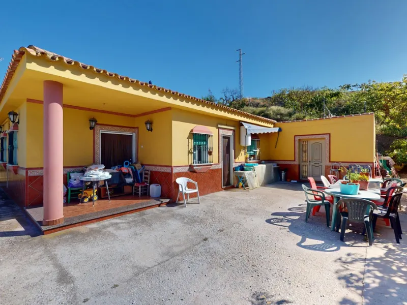 This charming finca is situated in a serene and peaceful location, offering picturesque views of the surrounding landscape. The expansive property boasts 280 magnificent mango trees, 90 stately avocado trees, and several blooming citrus trees, creating a 