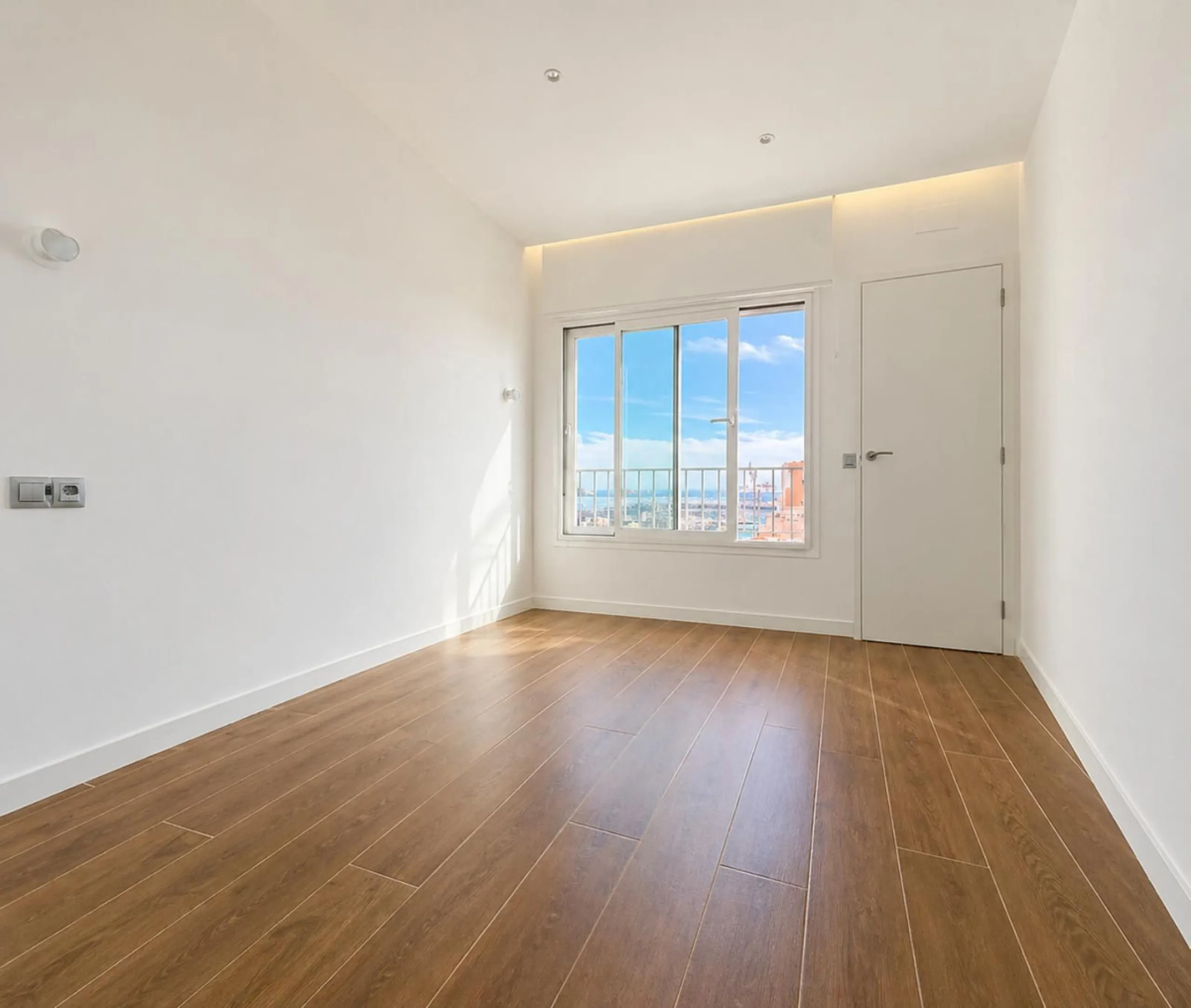 Recently Renovated 1-Bedroom Apartment with Stunning City, Sea, and Port Views