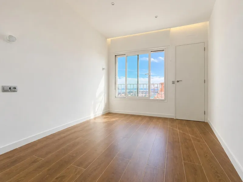 Recently Renovated 1-Bedroom Apartment with Stunning City, Sea, and Port Views