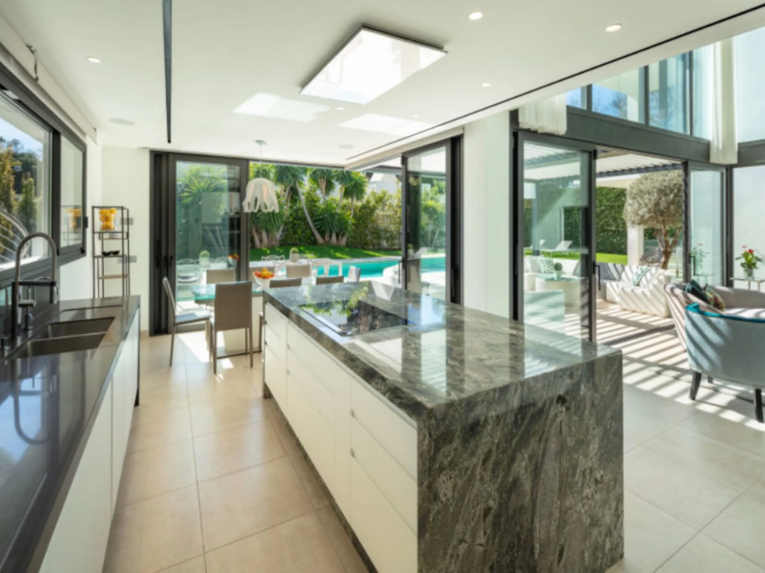 This contemporary villa provides the ultimate in beach side luxury living. Located in the beautiful beachside resort of Puerto Banus, 200 meters walking distance to the beach, close to shops and nightlife of Puerto Banus and short driving distance from Ma