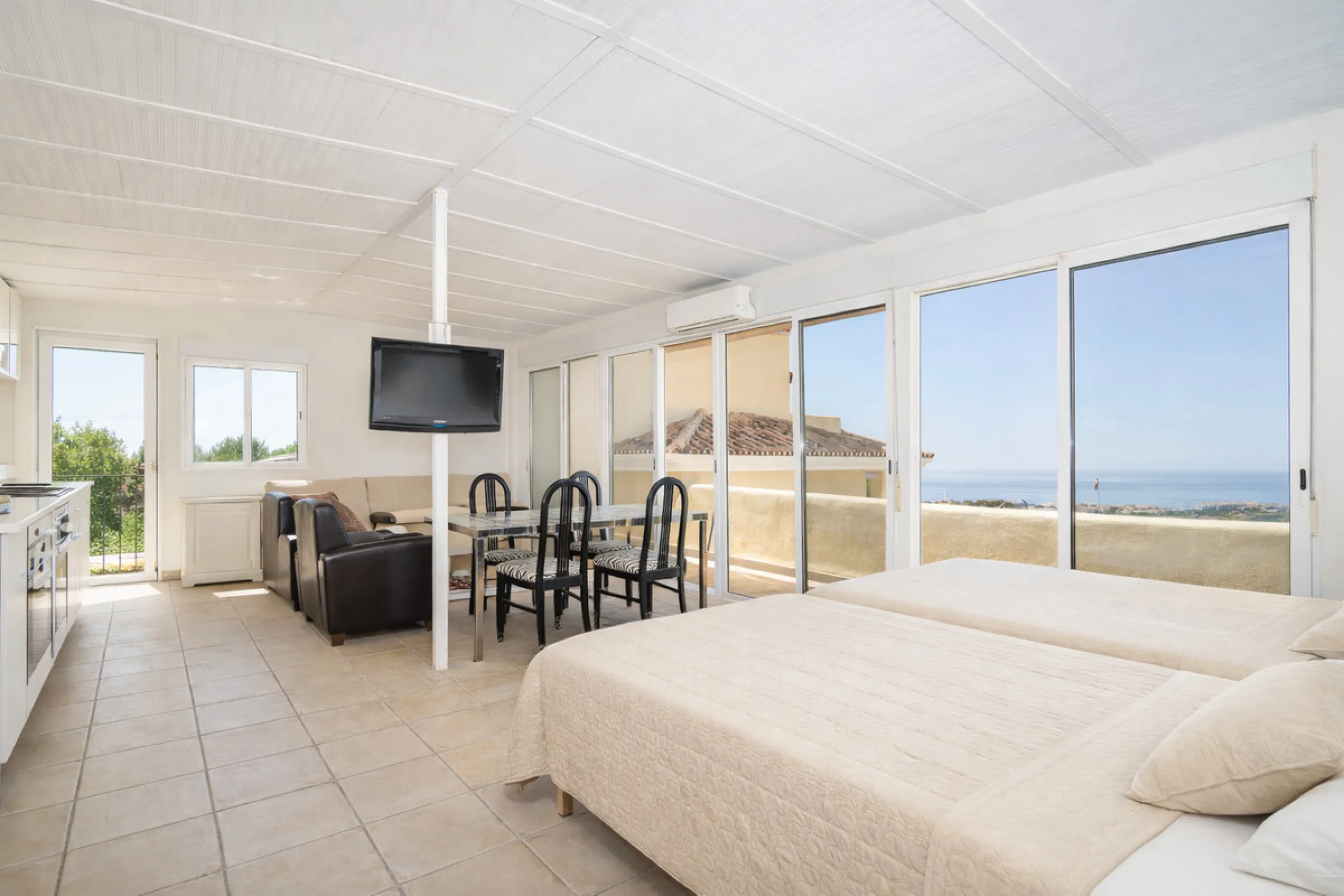 This unique property offers a rare combination of privacy, scale and income potential, set within a natural hillside environment above Estepona. Surrounded by countryside and open views, the estate enjoys far-reaching panoramas across the town, marina, Me