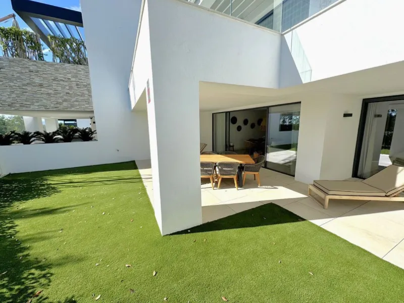 Elevated ground floor apartment in modern Urbanisation Artola Homes.