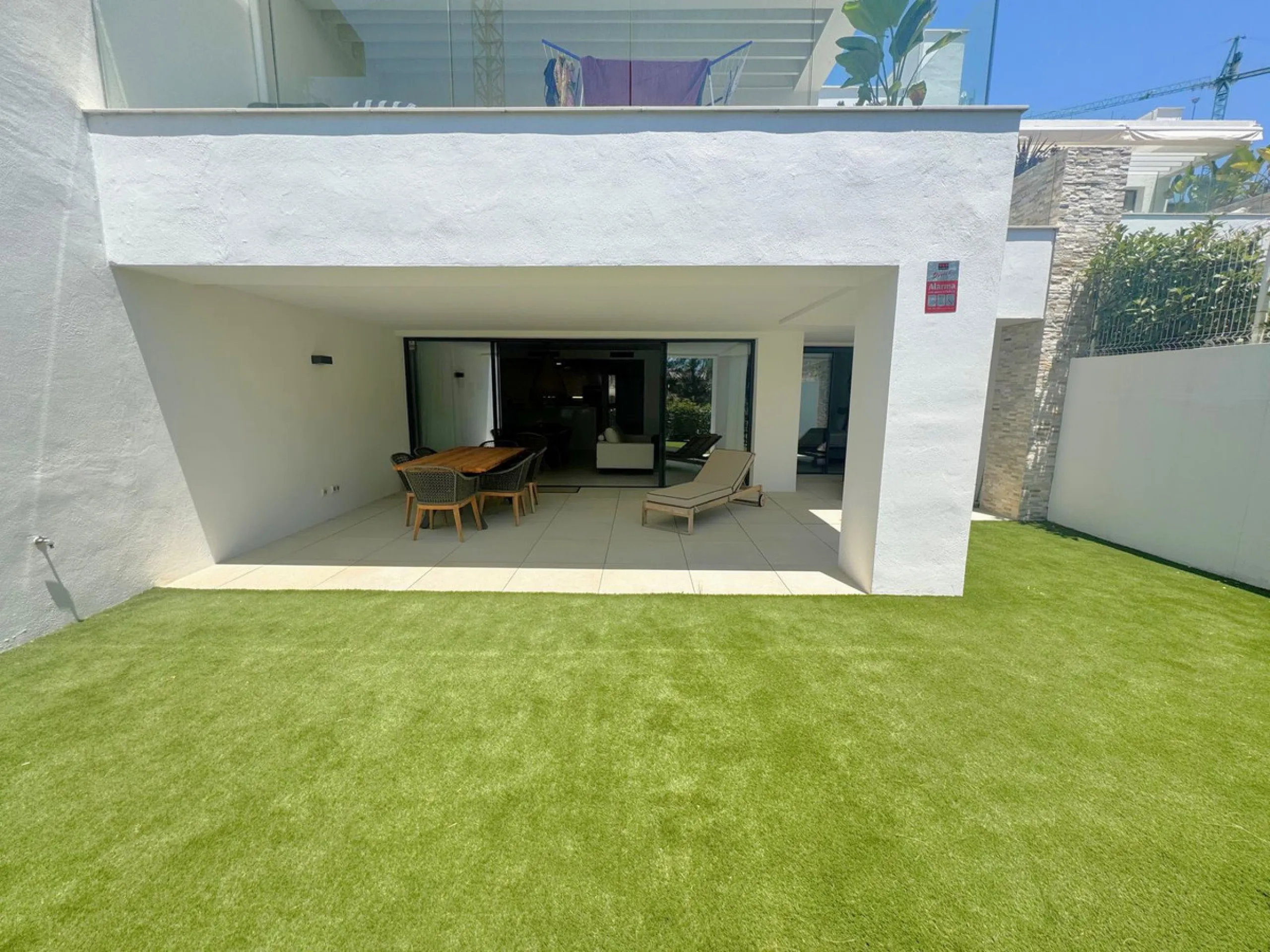 Elevated ground floor apartment in modern Urbanisation Artola Homes.