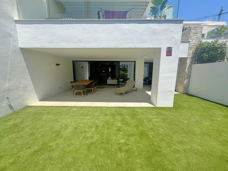 Elevated ground floor apartment in modern Urbanisation Artola Homes.
