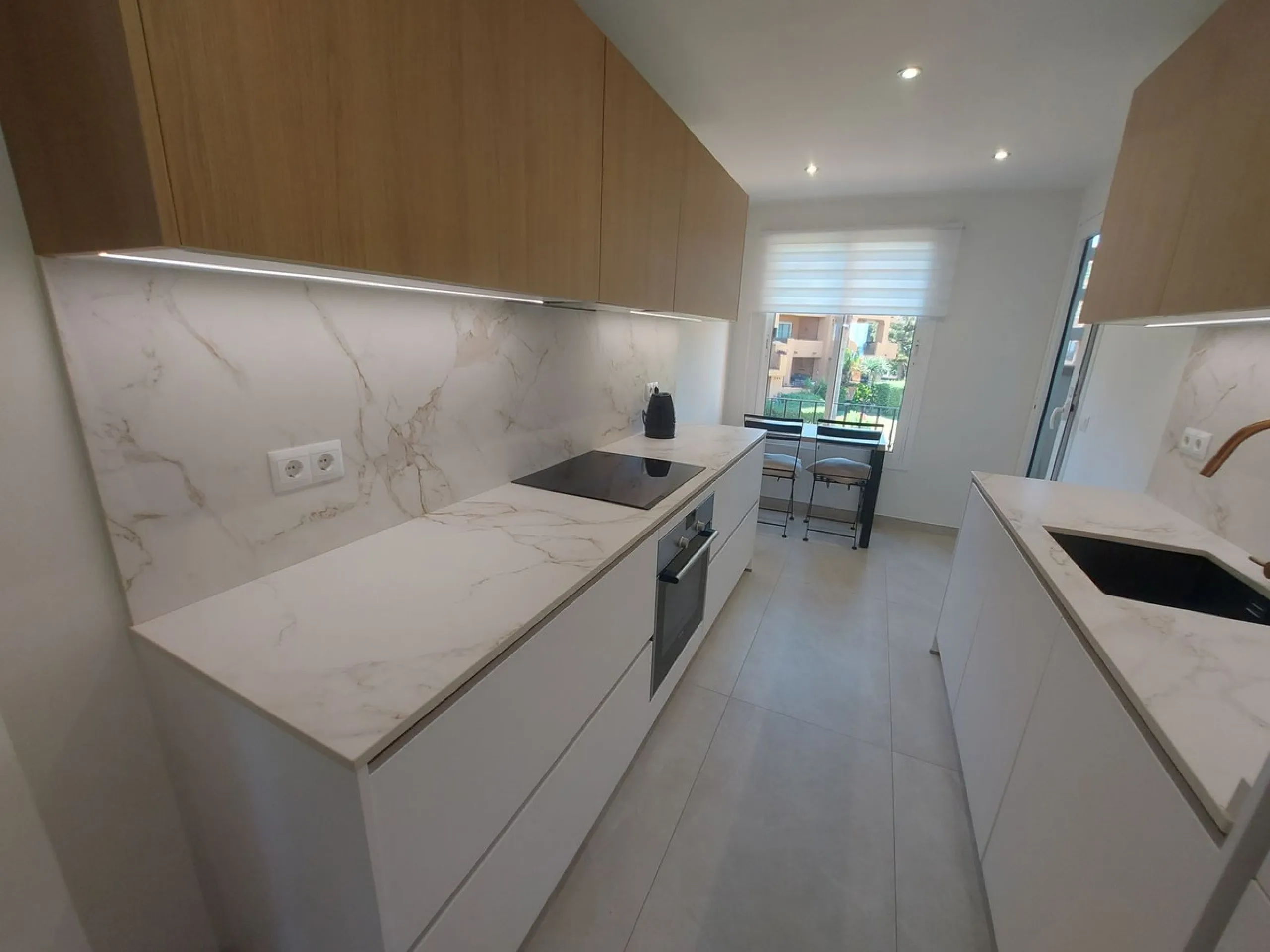 Urb. Los Granados - Sought after front line Beach development. A well presented modernised (new top of the range kitchen) front line beach 2 bedroom corner apartment with uninterrupted beach and sea views from the terrace. The complex is located on the be