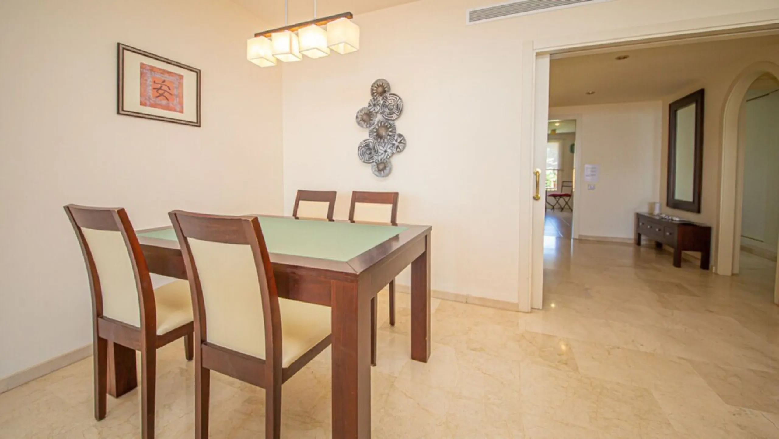 Urb. Los Granados - Sought after front line Beach development. A well presented modernised (new top of the range kitchen) front line beach 2 bedroom corner apartment with uninterrupted beach and sea views from the terrace. The complex is located on the be