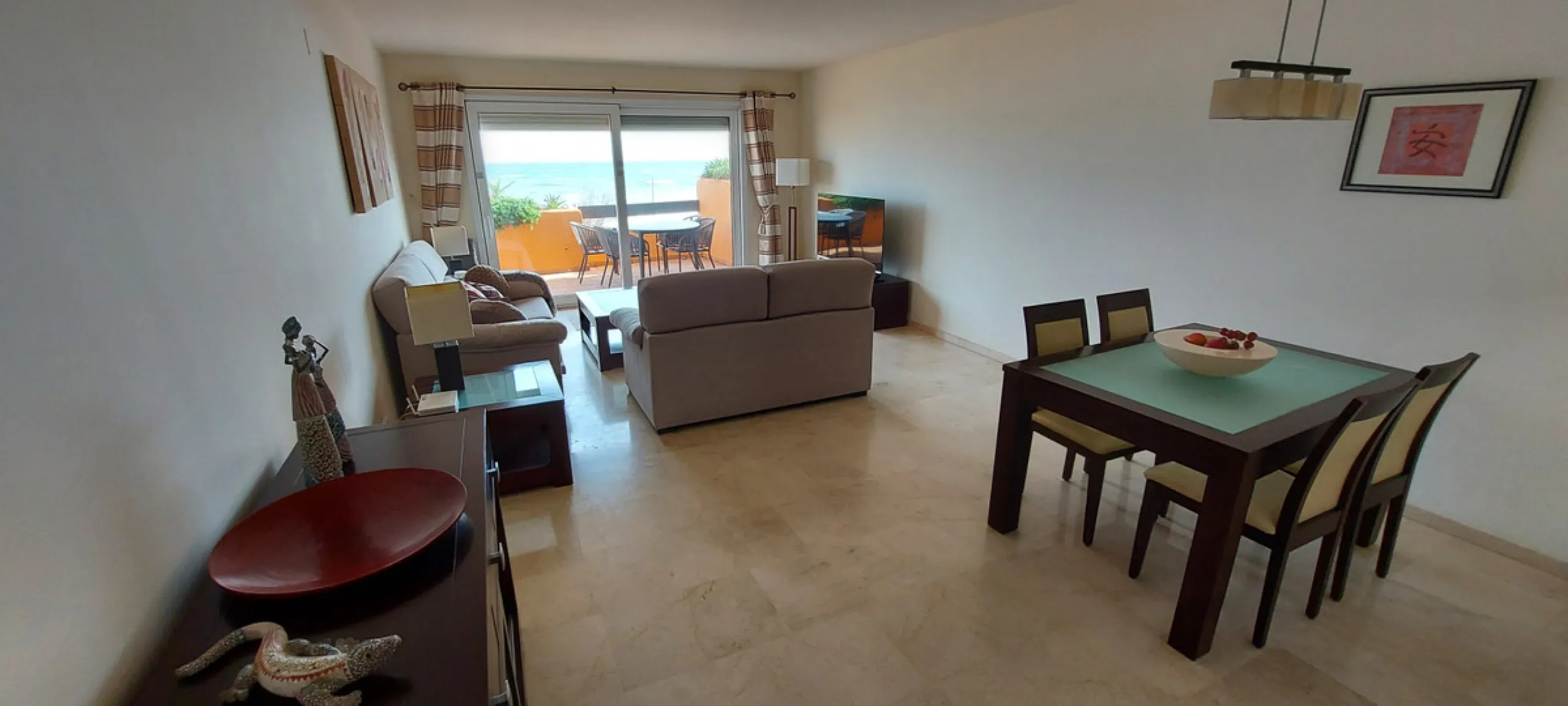 Urb. Los Granados - Sought after front line Beach development. A well presented modernised (new top of the range kitchen) front line beach 2 bedroom corner apartment with uninterrupted beach and sea views from the terrace. The complex is located on the be