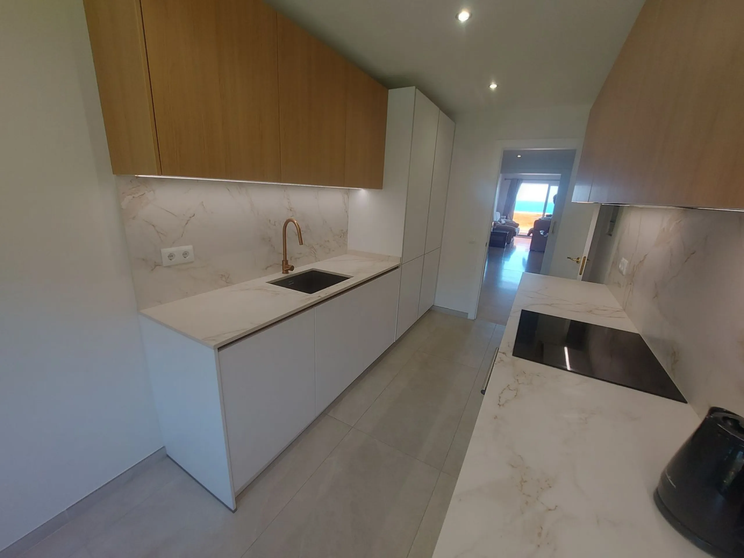 Urb. Los Granados - Sought after front line Beach development. A well presented modernised (new top of the range kitchen) front line beach 2 bedroom corner apartment with uninterrupted beach and sea views from the terrace. The complex is located on the be