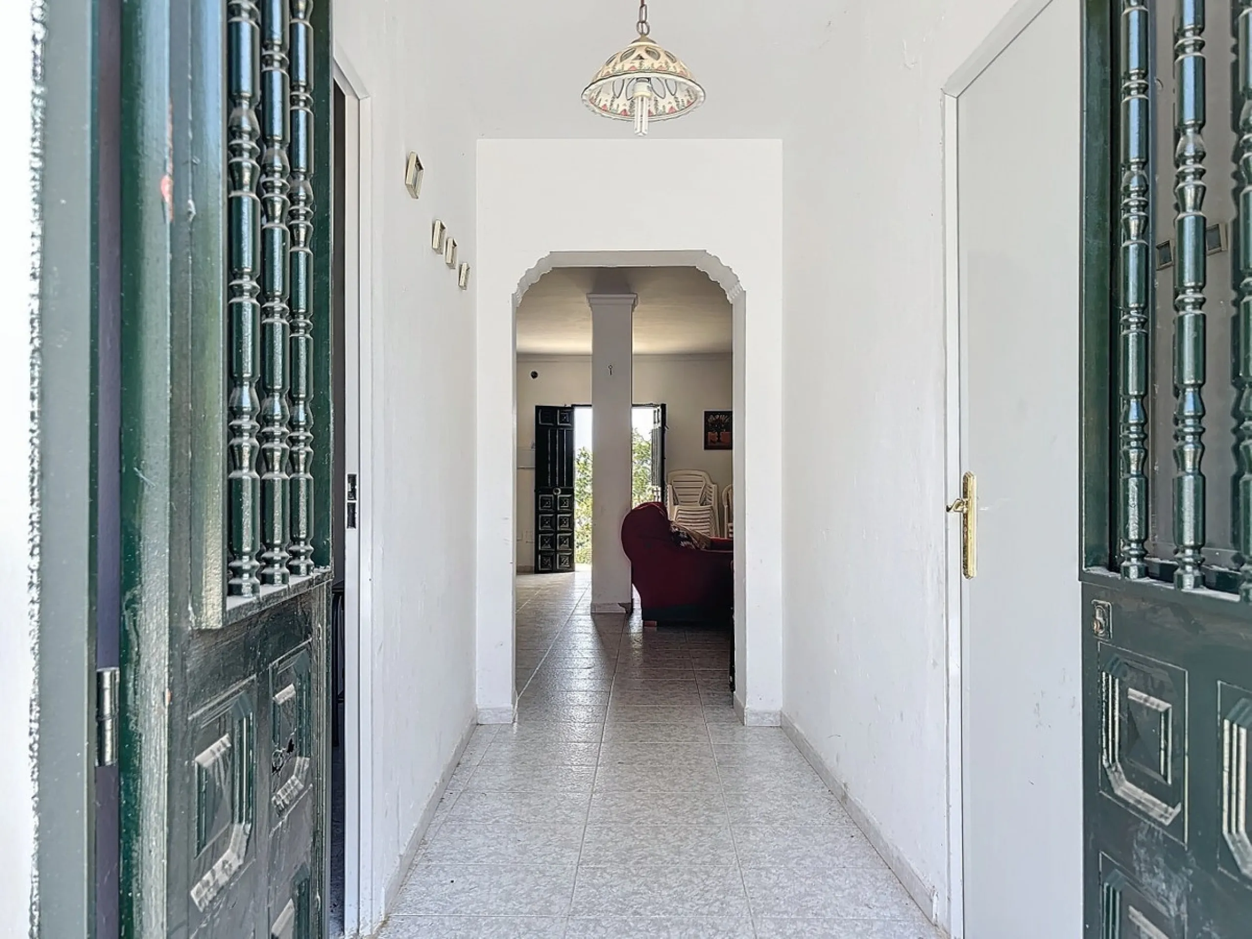 For sale: an impressive country house in Torre del Mar, perfect for those seeking a retreat in the heart of nature without sacrificing comfort. The property boasts a living area of 224 m2 and is situated on a large, fully fenced plot of 4045 m2, ensuring 