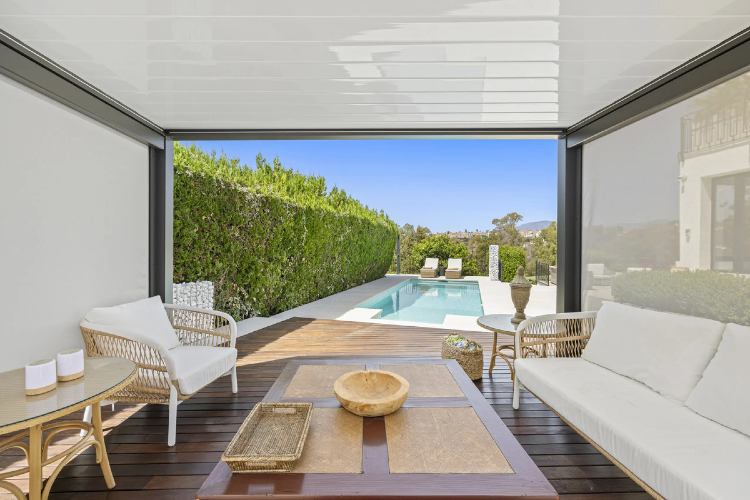 This west-facing villa boasts a modern design and is ideally situated next to the Guadalmina Golf Course. The property, spans two levels, offers privacy, convenience, and ample space for a large family.