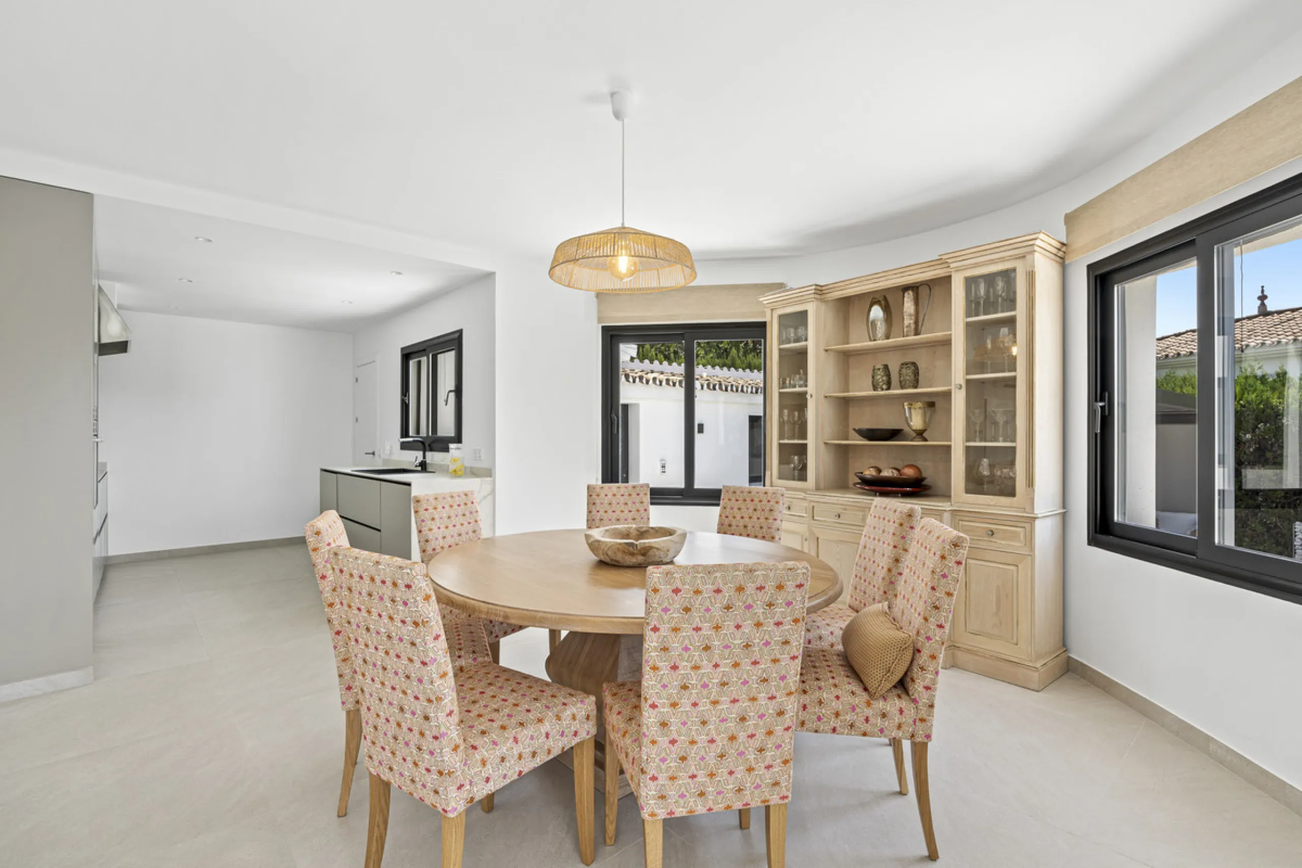 This west-facing villa boasts a modern design and is ideally situated next to the Guadalmina Golf Course. The property, spans two levels, offers privacy, convenience, and ample space for a large family.