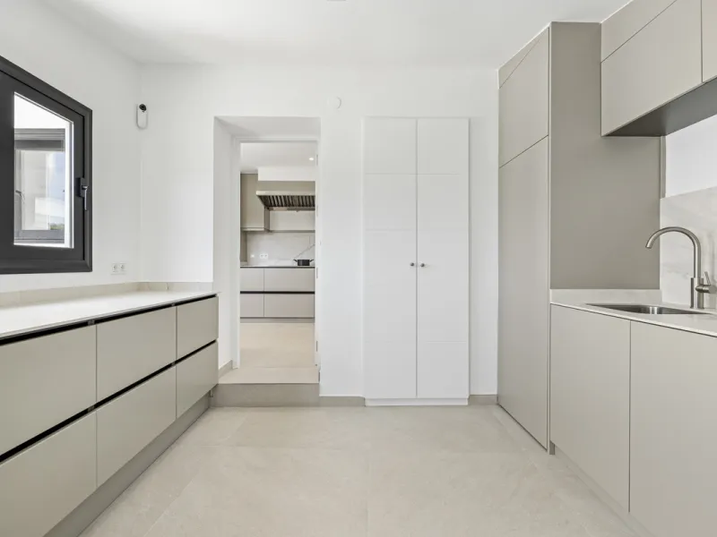 This west-facing villa boasts a modern design and is ideally situated next to the Guadalmina Golf Course. The property, spans two levels, offers privacy, convenience, and ample space for a large family.