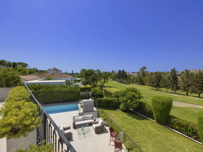 This west-facing villa boasts a modern design and is ideally situated next to the Guadalmina Golf Course. The property, spans two levels, offers privacy, convenience, and ample space for a large family.