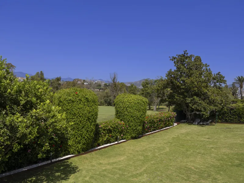 This west-facing villa boasts a modern design and is ideally situated next to the Guadalmina Golf Course. The property, spans two levels, offers privacy, convenience, and ample space for a large family.