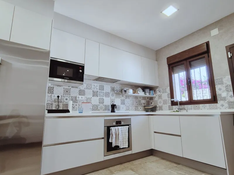 Discover this stunning Mediterranean-style home, located just a few meters from the sea. This charming residence offers an unbeatable location, with restaurants nearby and a seaside promenade within easy walking distance. The house features five spacious 