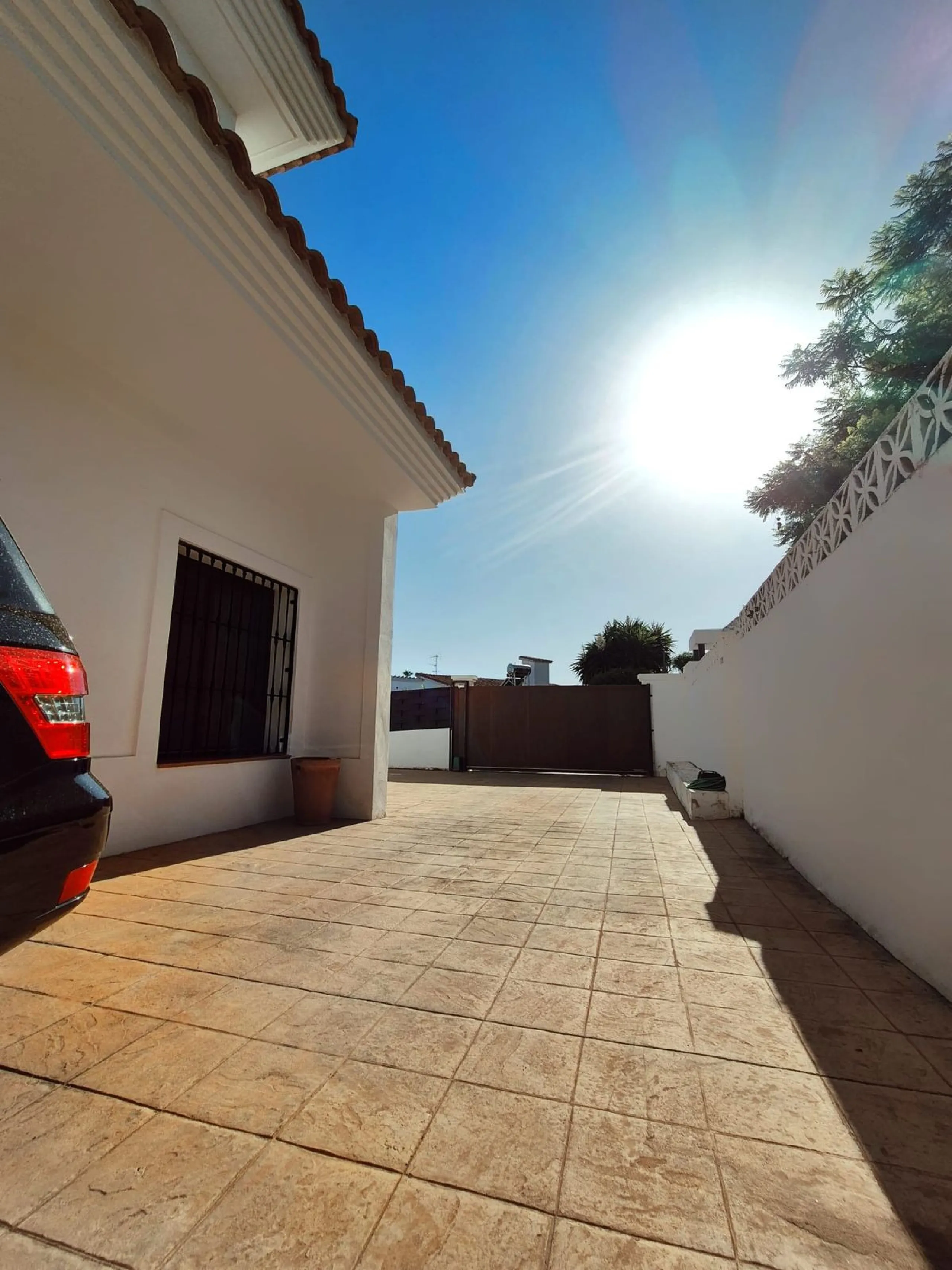 Discover this stunning Mediterranean-style home, located just a few meters from the sea. This charming residence offers an unbeatable location, with restaurants nearby and a seaside promenade within easy walking distance. The house features five spacious 